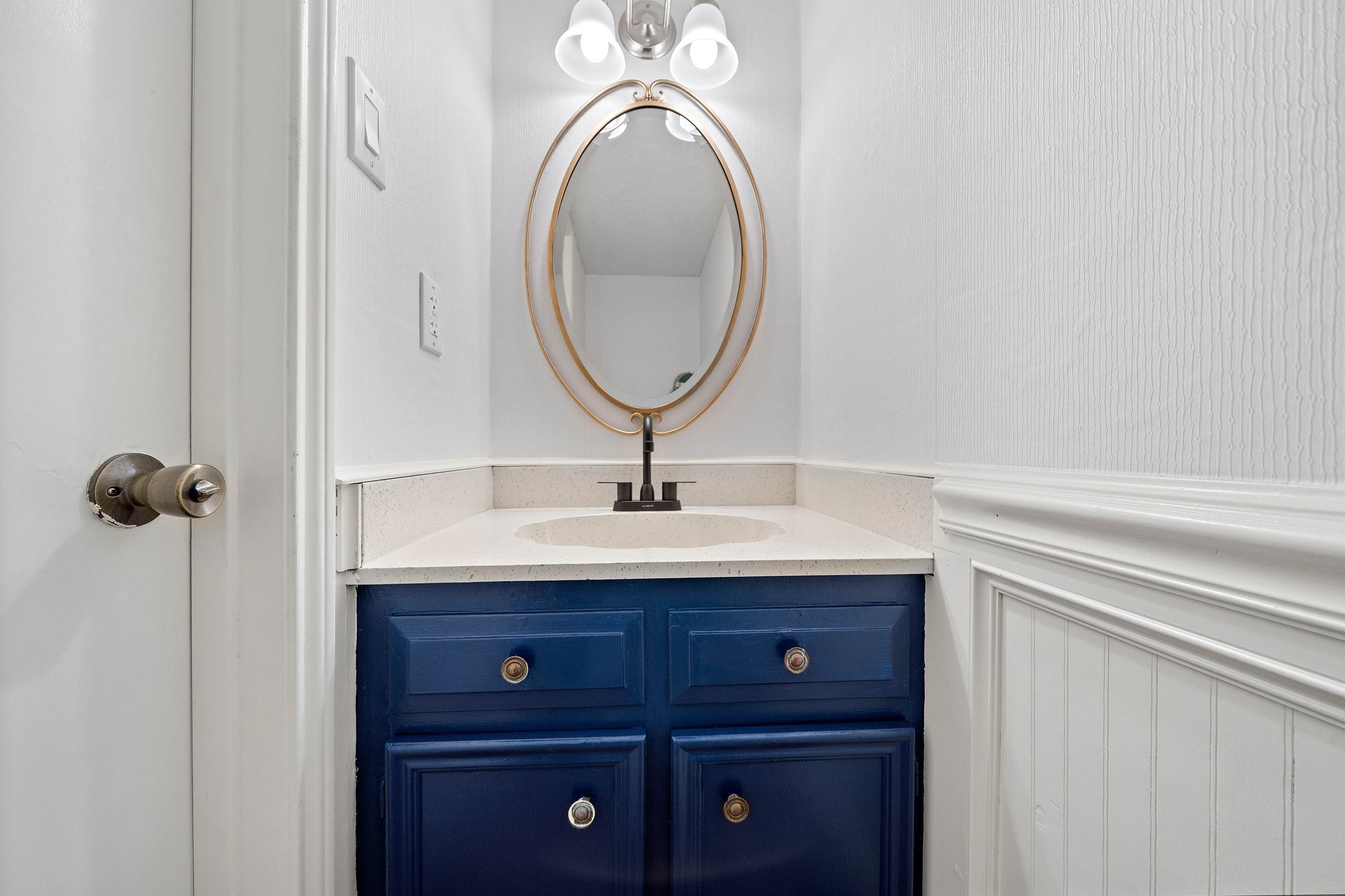 17116 Beaver Springs Drive, Unit 7 Houston, TX 77090 - Photo 14 of 14 a bathroom with a sink and a mirror