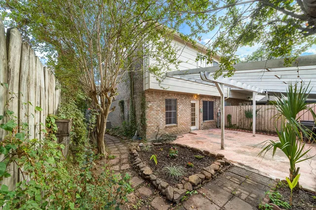 a front view of a house with a patio