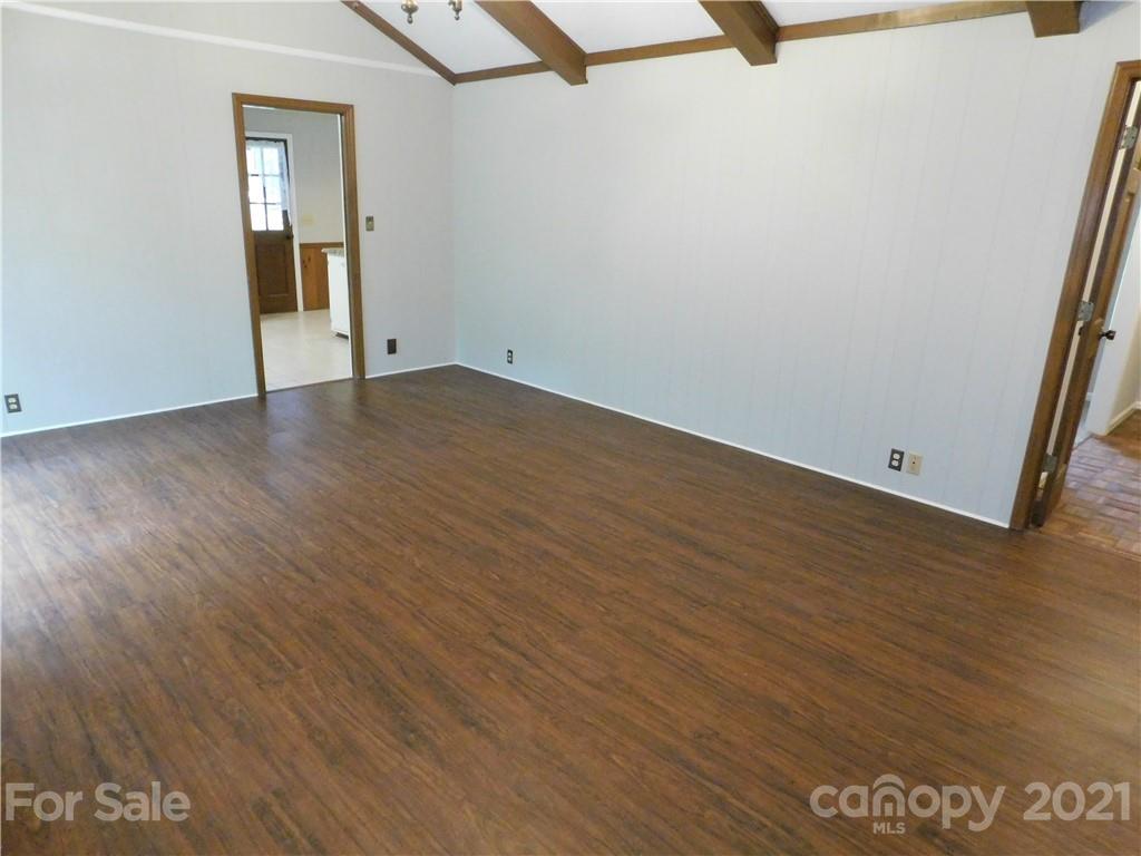 2136 Sunset Road Charlotte, NC 28216 - Photo 18 of 34 wooden floor in an empty room