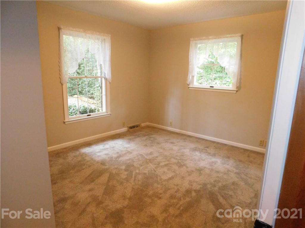 2136 Sunset Road Charlotte, NC 28216 - Photo 28 of 34 a view of an empty room with a window