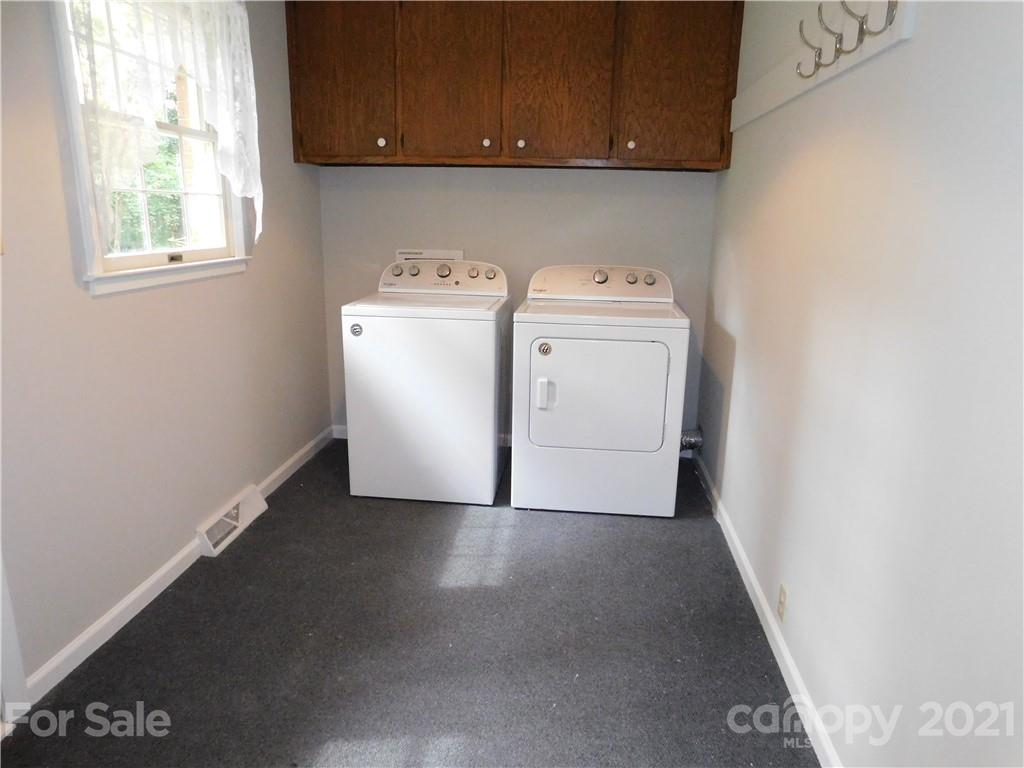 2136 Sunset Road Charlotte, NC 28216 - Photo 7 of 34 a utility room with dryer and washer
