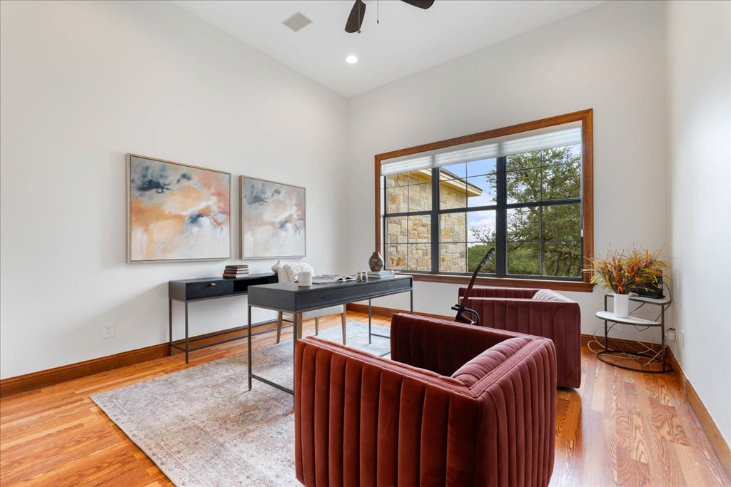 1525 Springlake Drive Dripping Springs, TX 78620 - Photo 19 of 38 a kitchen that has a sink and a window