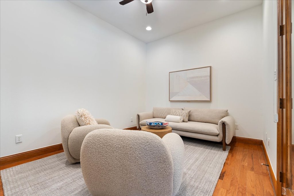 1525 Springlake Drive Dripping Springs, TX 78620 - Photo 21 of 38 a living room with furniture and a couch