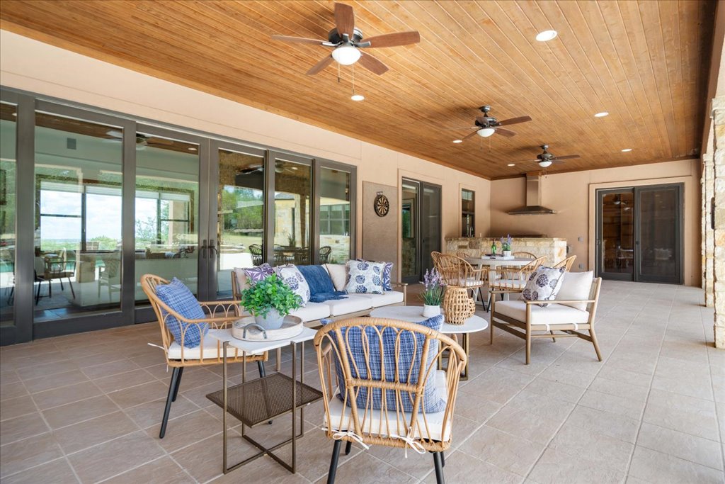 1525 Springlake Drive Dripping Springs, TX 78620 - Photo 30 of 38 a view of a dining room with furniture window and outside view
