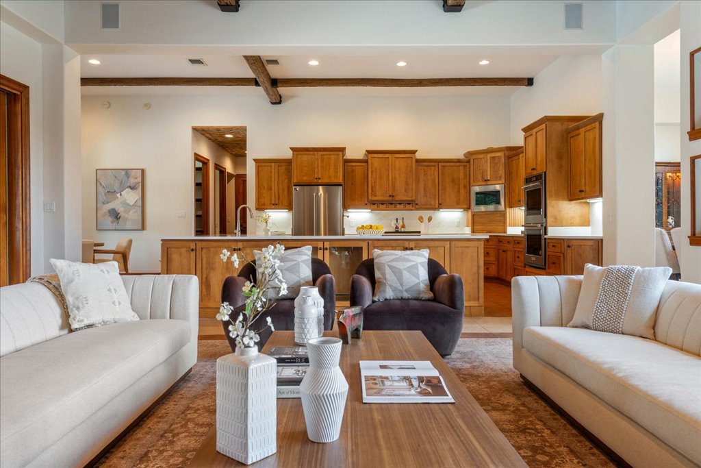 1525 Springlake Drive Dripping Springs, TX 78620 - Photo 38 of 38 a living room with furniture wooden floor and a table