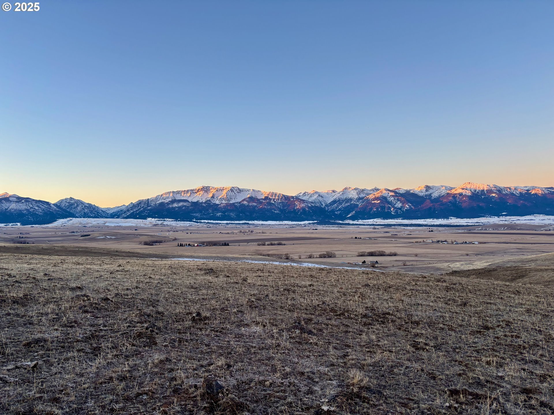 a view of lake with mountain in the background
