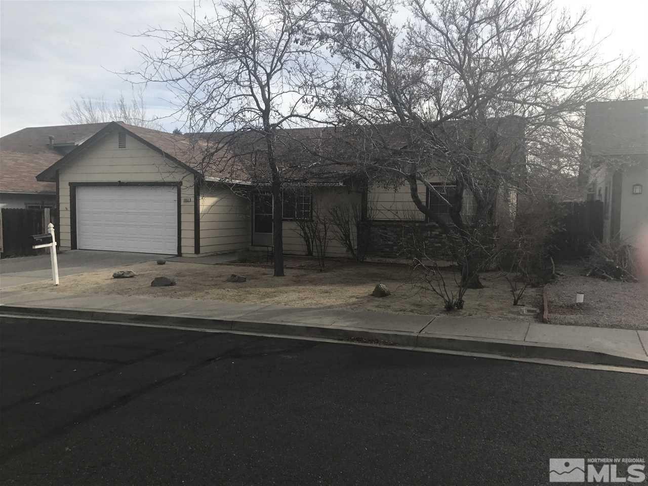 1965 Peavine Road Reno, NV 89503 - Photo 1 of 1 a front view of a house with a yard