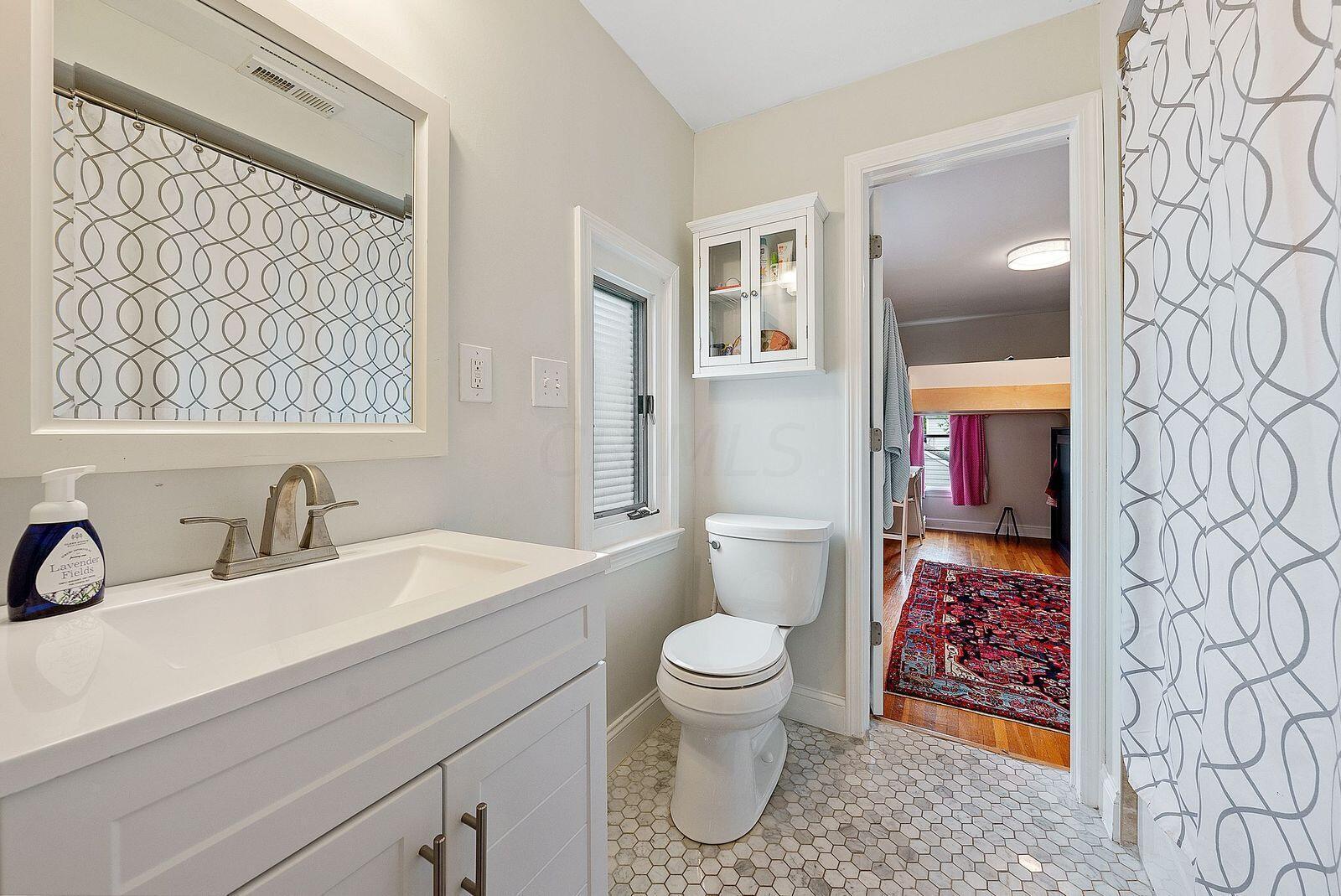 2576 Camden Road Columbus, OH 43221 - Photo 29 of 59 Between the second and third bedrooms is a Jack and Jill bath with bathtub/shower combo... hard to come by for the area!