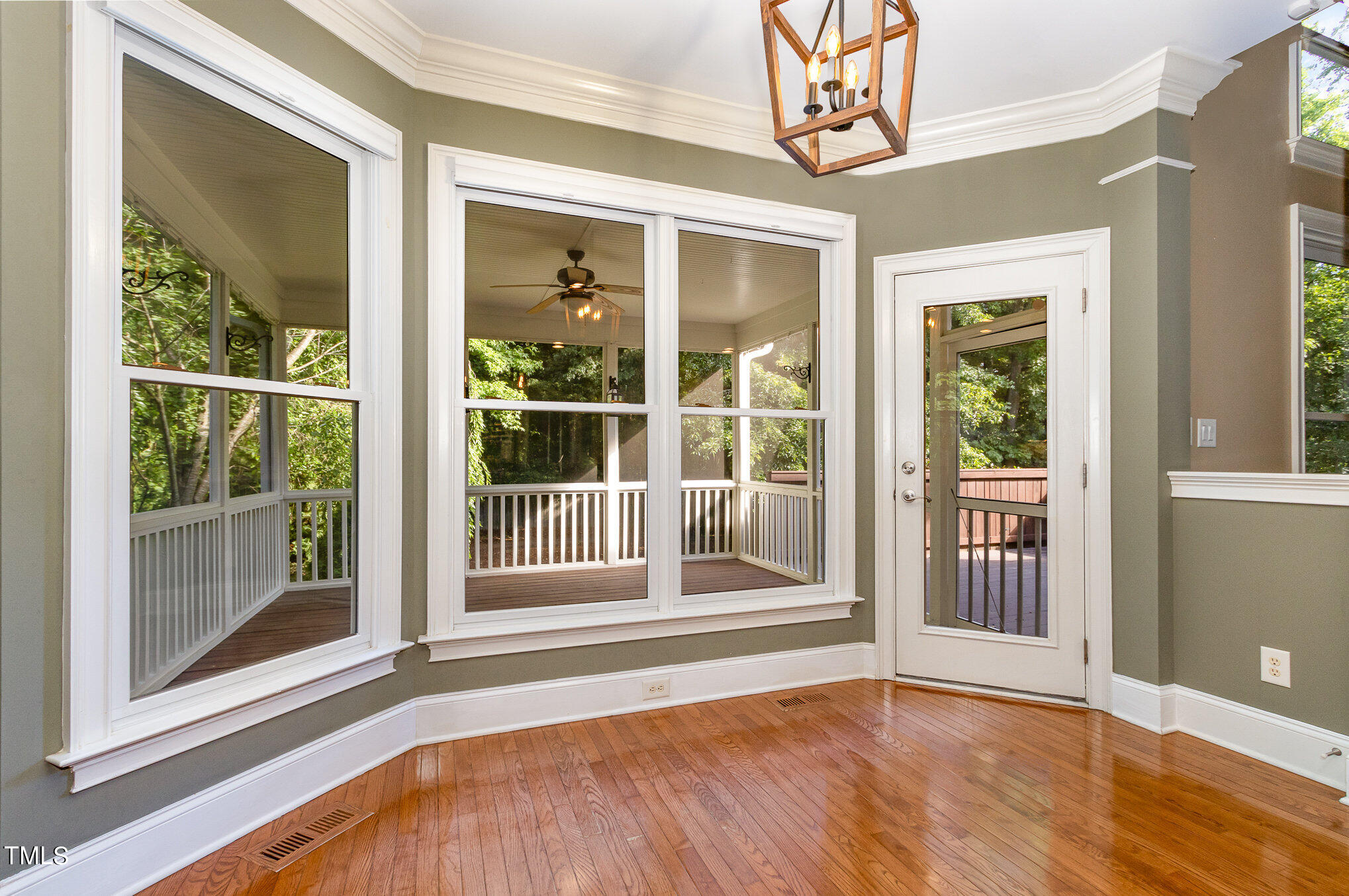 8319 La Matisse Road Raleigh, NC 27615 - Photo 16 of 46 A great time of year to keep the Kitchen door open to the Screen Porch and let the breeze run through the Kitchen.