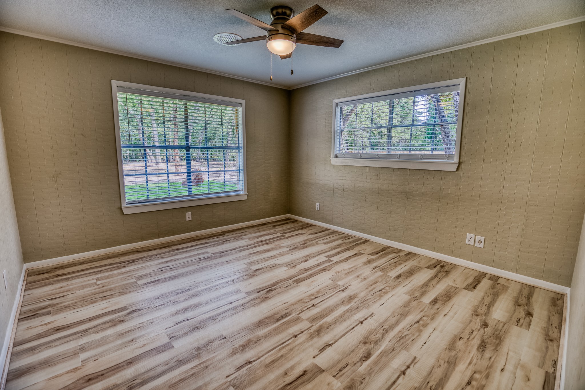 5504 Hillside Lane Brenham, TX 77833 - Photo 35 of 47 a view of an empty room with wooden floor and a window