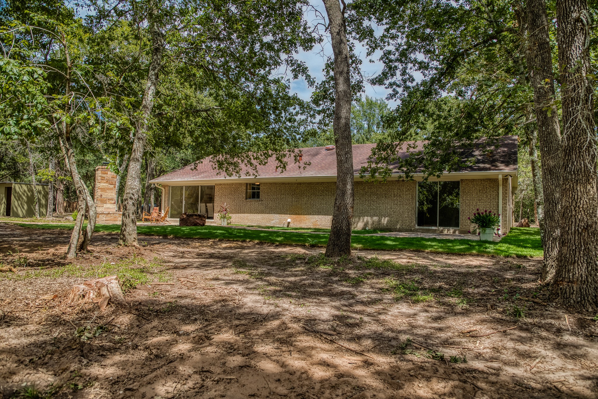 5504 Hillside Lane Brenham, TX 77833 - Photo 37 of 47 a view of a house with a yard and large tree