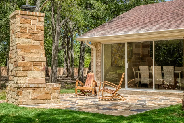 a building with trees in the background