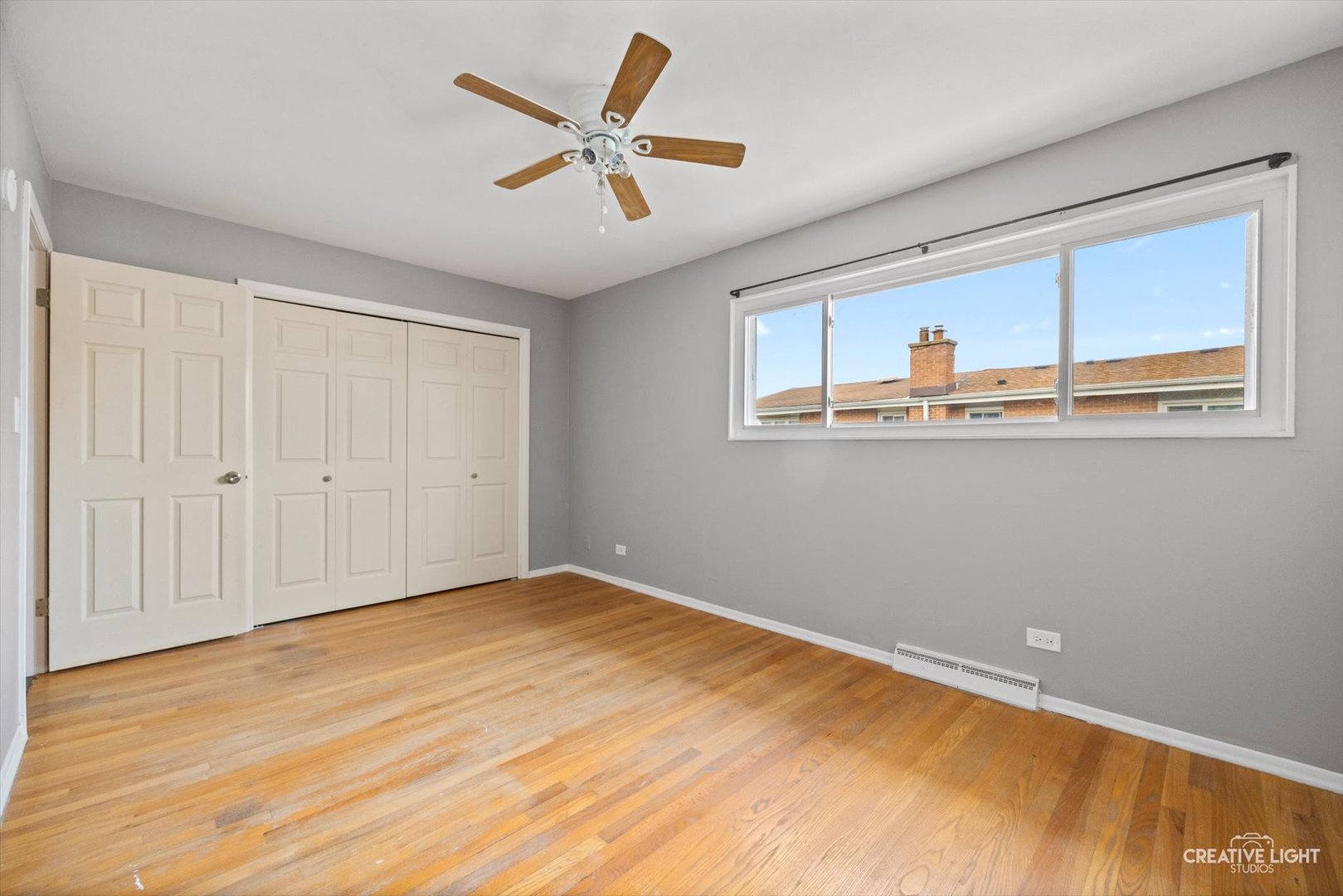 8044 West Lyons Street, Unit B Niles, IL 60714 - Photo 12 of 17 a view of empty room with wooden floor