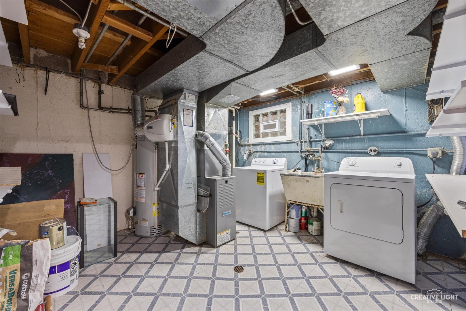8044 West Lyons Street, Unit B Niles, IL 60714 - Photo 14 of 17 a utility room with dryer and washer