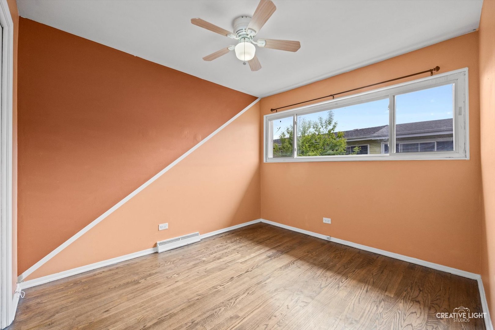8044 West Lyons Street, Unit B Niles, IL 60714 - Photo 10 of 17 a view of an empty room with a window