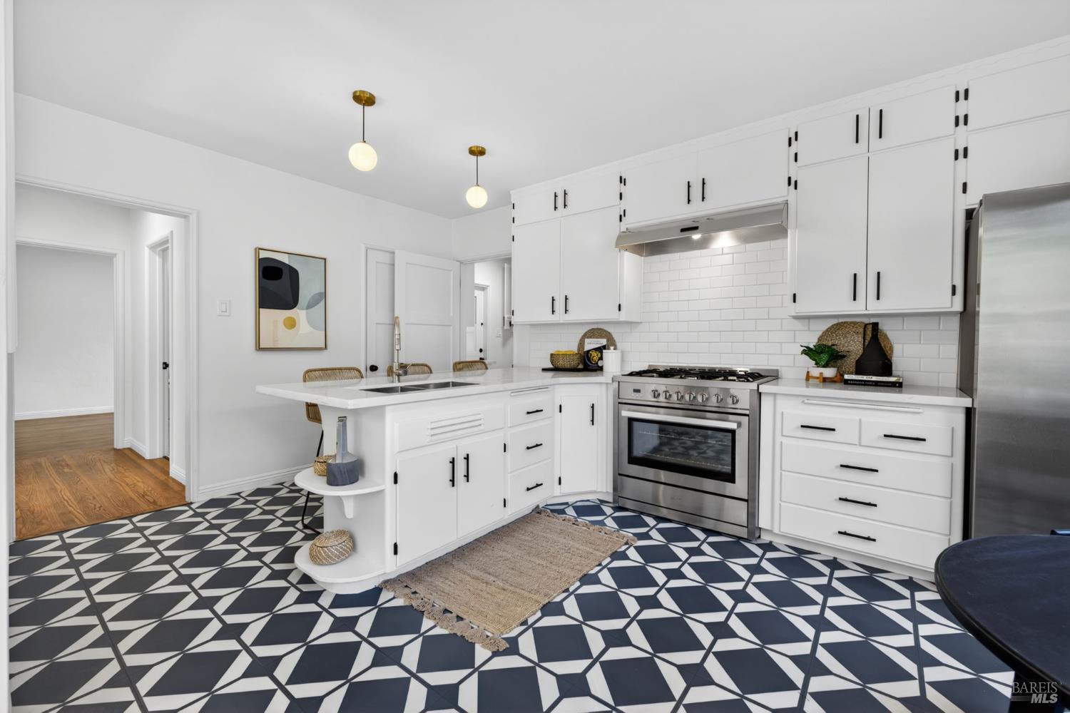 2211 Humboldt Street Santa Rosa, CA 95404 - Photo 15 of 52 a kitchen with a stove oven and sink
