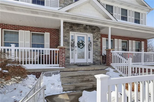 front view of a house with a deck