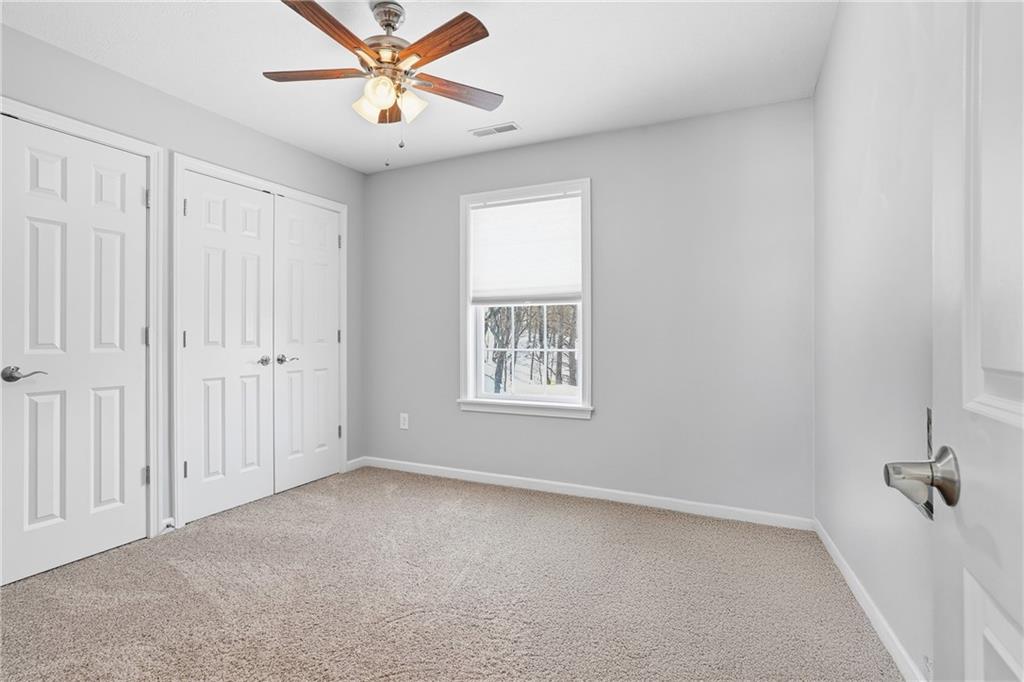 100 Mary Street Monaca, PA 15061 - Photo 35 of 49 an empty room with windows and fan