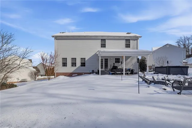 a view of a patio with a yard