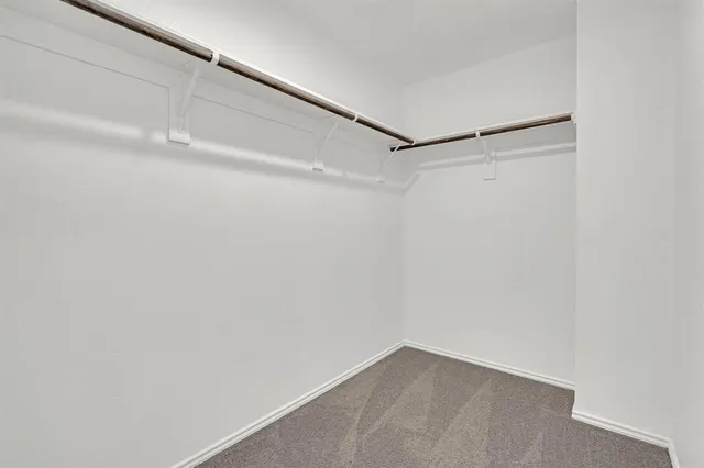 a view of a tiny house with a yard