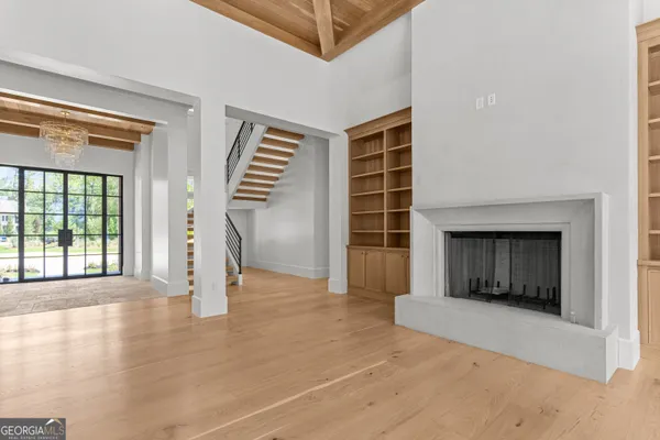 a view of a hallway with windows