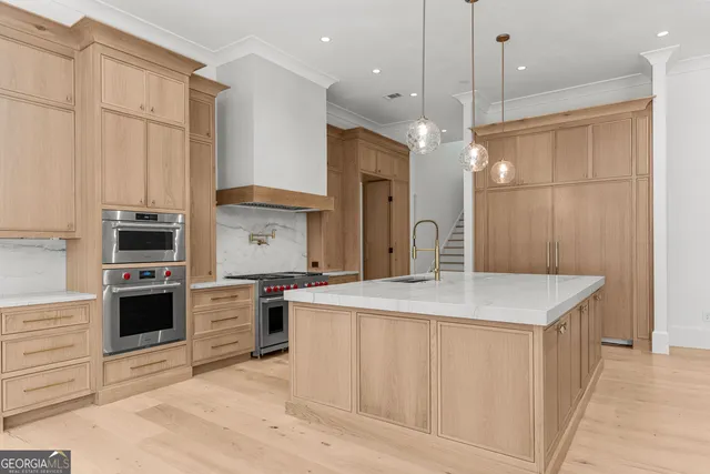 an empty room with a empty space and windows