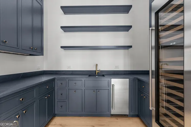 a view of an empty room with windows