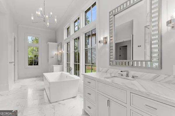 an aerial view of a houses with lake view