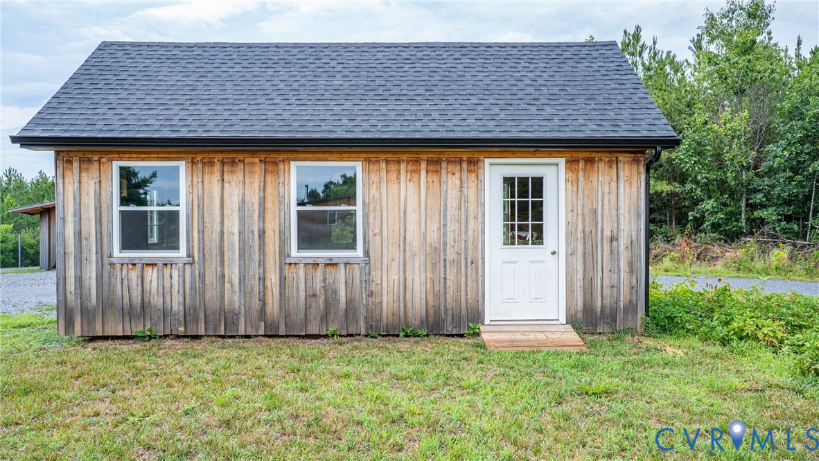 1451 Dixie Hill Road Dillwyn, VA 23936 - Photo 41 of 51 Wood-sided auxiliary building featuring a dark shi