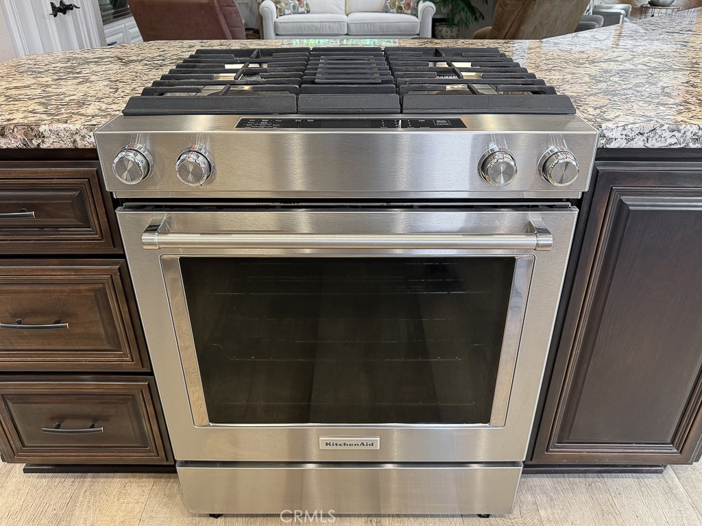 2298 Tipton Street Cambria, CA 93428 - Photo 14 of 54 a stove top oven sitting inside of a kitchen