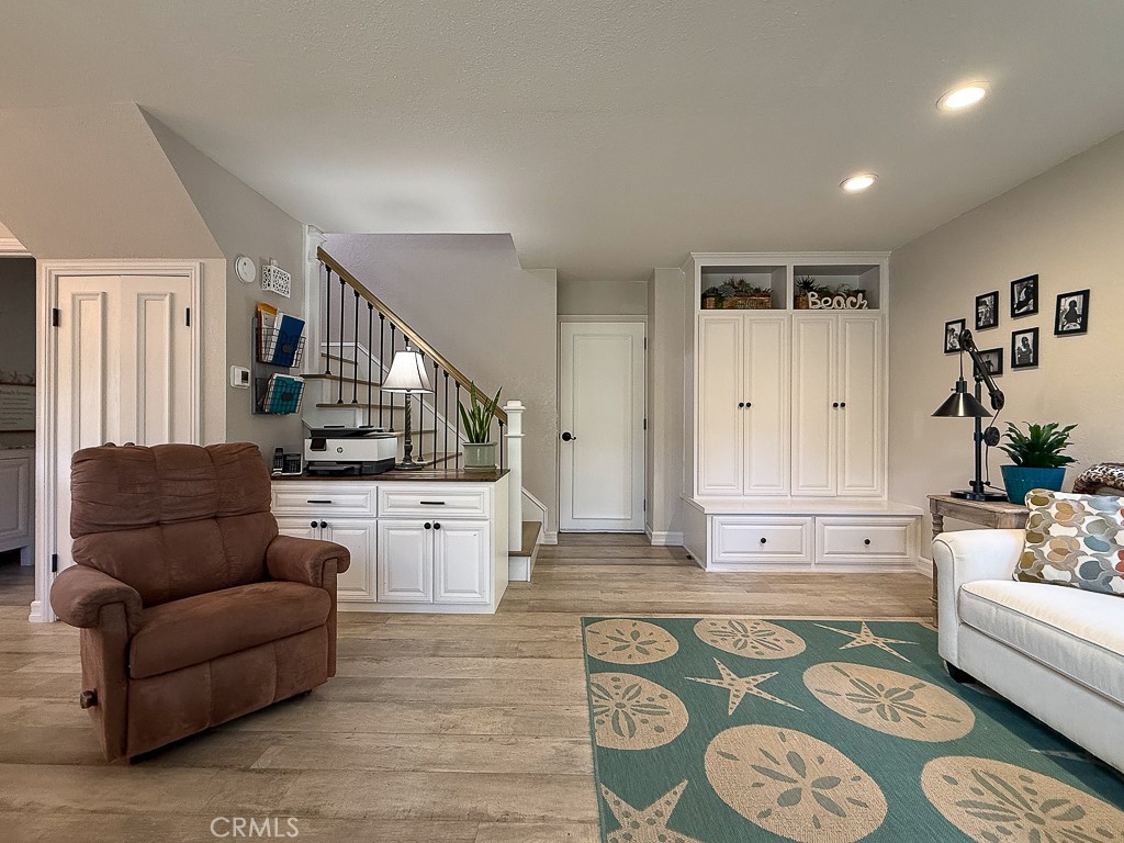 2298 Tipton Street Cambria, CA 93428 - Photo 22 of 54 a living room with furniture and a kitchen view