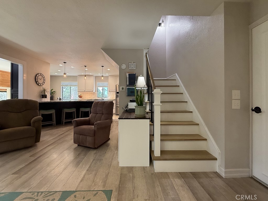 2298 Tipton Street Cambria, CA 93428 - Photo 25 of 54 a living room with furniture and wooden floor