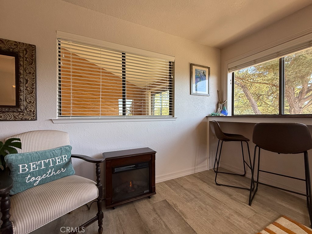 2298 Tipton Street Cambria, CA 93428 - Photo 29 of 54 a workspace with furniture and a window