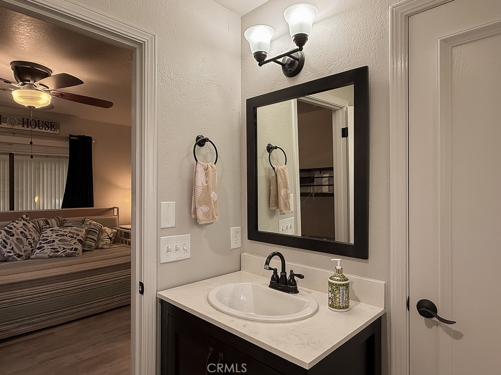 2298 Tipton Street Cambria, CA 93428 - Photo 37 of 54 a bathroom with a sink and a mirror