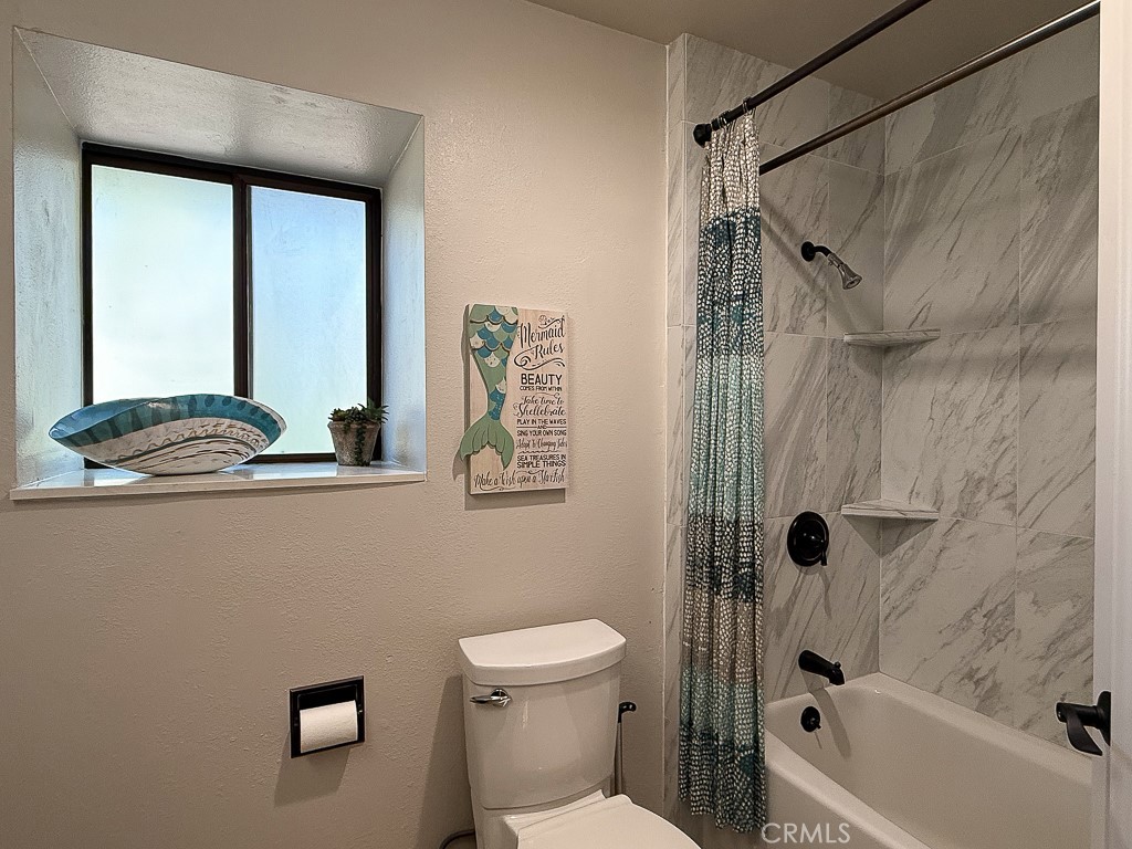 2298 Tipton Street Cambria, CA 93428 - Photo 38 of 54 a bathroom with a toilet and a shower