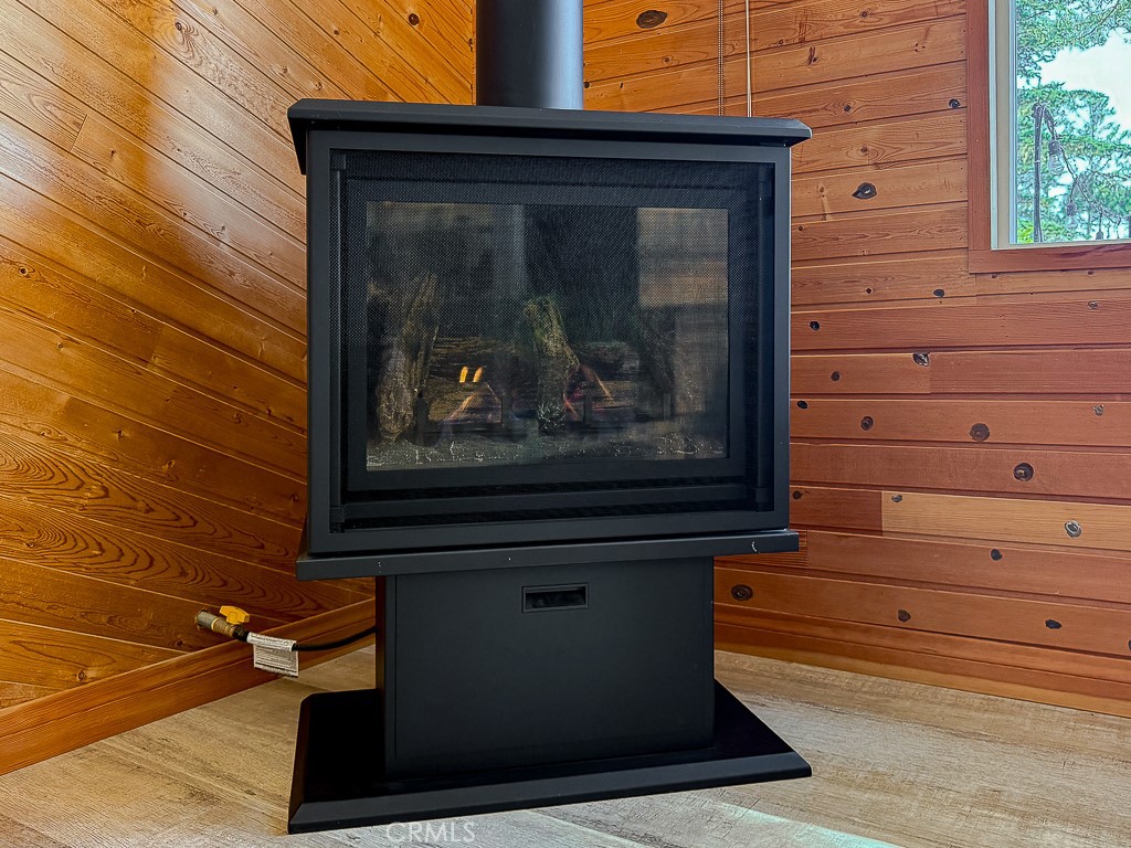 2298 Tipton Street Cambria, CA 93428 - Photo 7 of 54 a view of fireplace with wooden floor