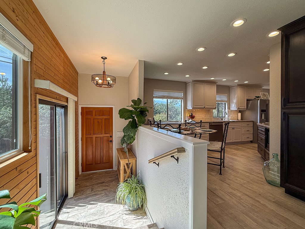 2298 Tipton Street Cambria, CA 93428 - Photo 8 of 54 a view of kitchen with cabinets and wooden floor