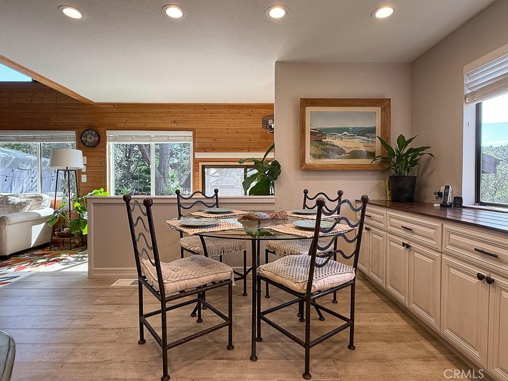 2298 Tipton Street Cambria, CA 93428 - Photo 10 of 54 a view of a dining room with furniture window and wooden floor