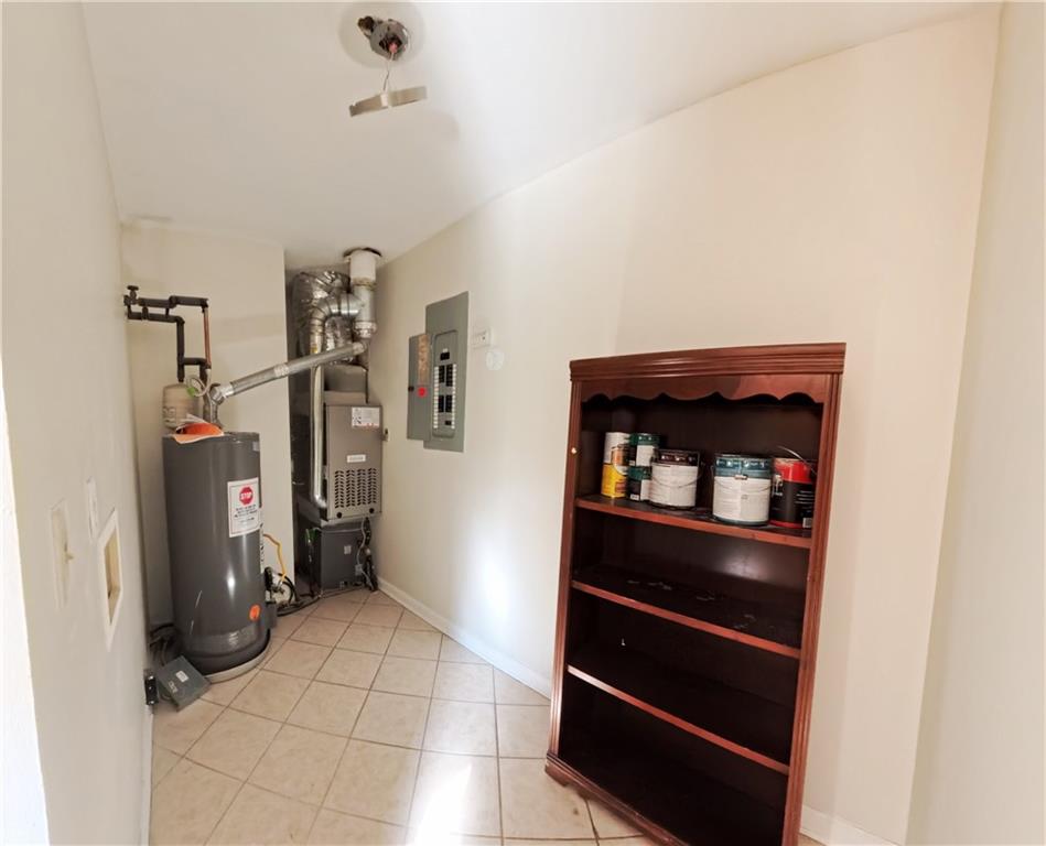 3881 Pin Oak Circle Atlanta, GA 30340 - Photo 19 of 26 a view of storage and utility room