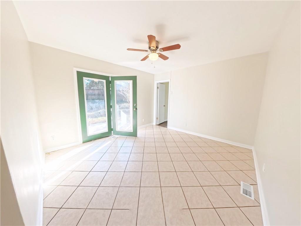 3881 Pin Oak Circle Atlanta, GA 30340 - Photo 23 of 26 a view of an empty room and window