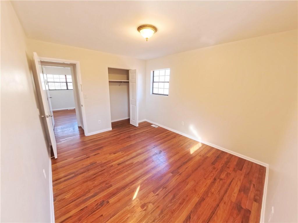3881 Pin Oak Circle Atlanta, GA 30340 - Photo 8 of 26 a view of a room with wooden floor and window