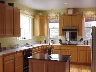8151 Ragle Place Sebastopol, CA 95472 - Photo 5 of 11 a kitchen with granite countertop a sink a counter top space and cabinets