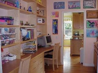 8151 Ragle Place Sebastopol, CA 95472 - Photo 8 of 11 a kitchen with a refrigerator and a stove top oven