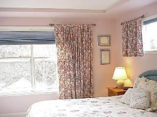 8151 Ragle Place Sebastopol, CA 95472 - Photo 10 of 11 a bedroom with a bed and a window
