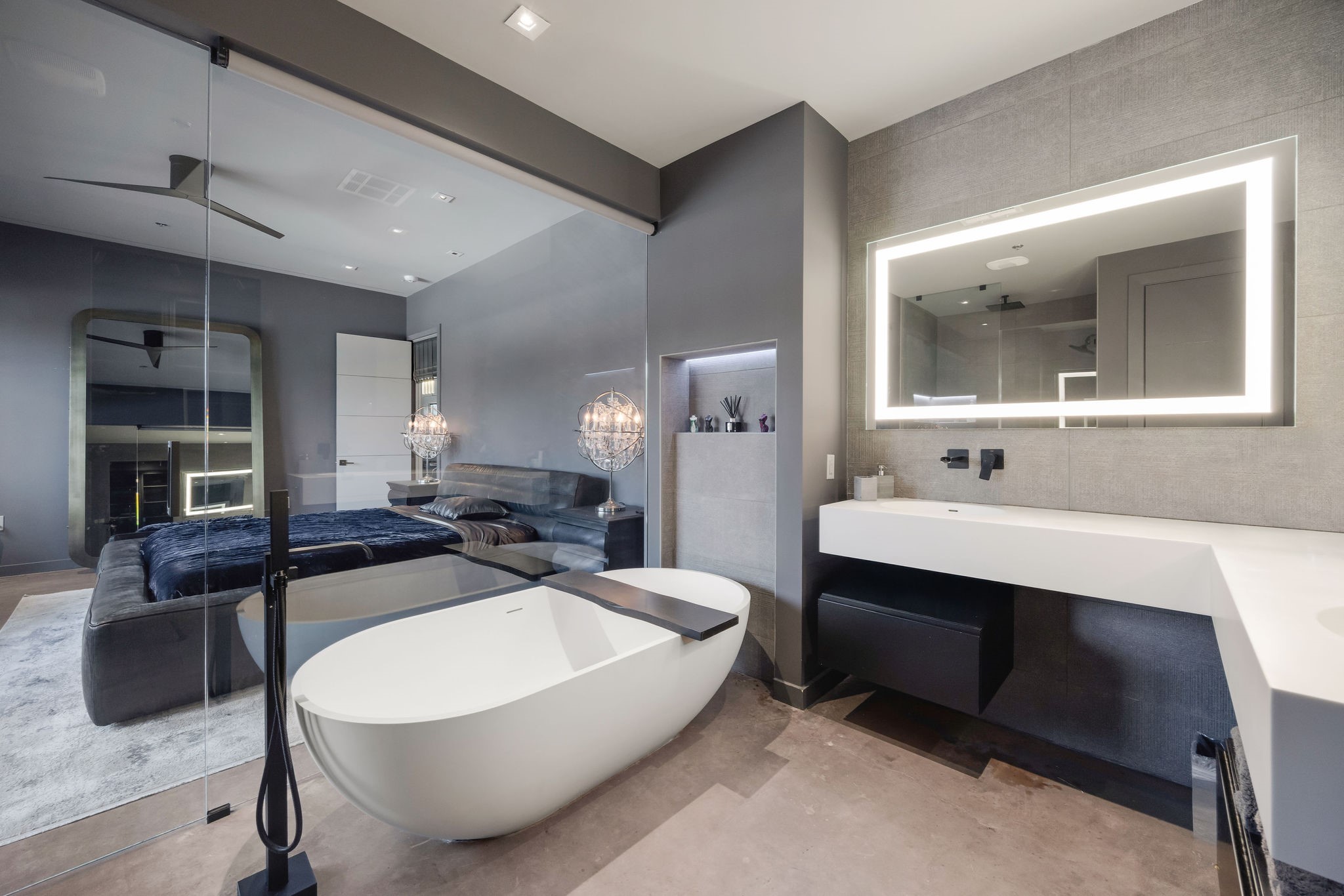 908 White Street Houston, TX 77007 - Photo 12 of 21 Spa-inspired primary bathroom with freestanding soaking tub, glass-enclosed shower, and dual vanity.