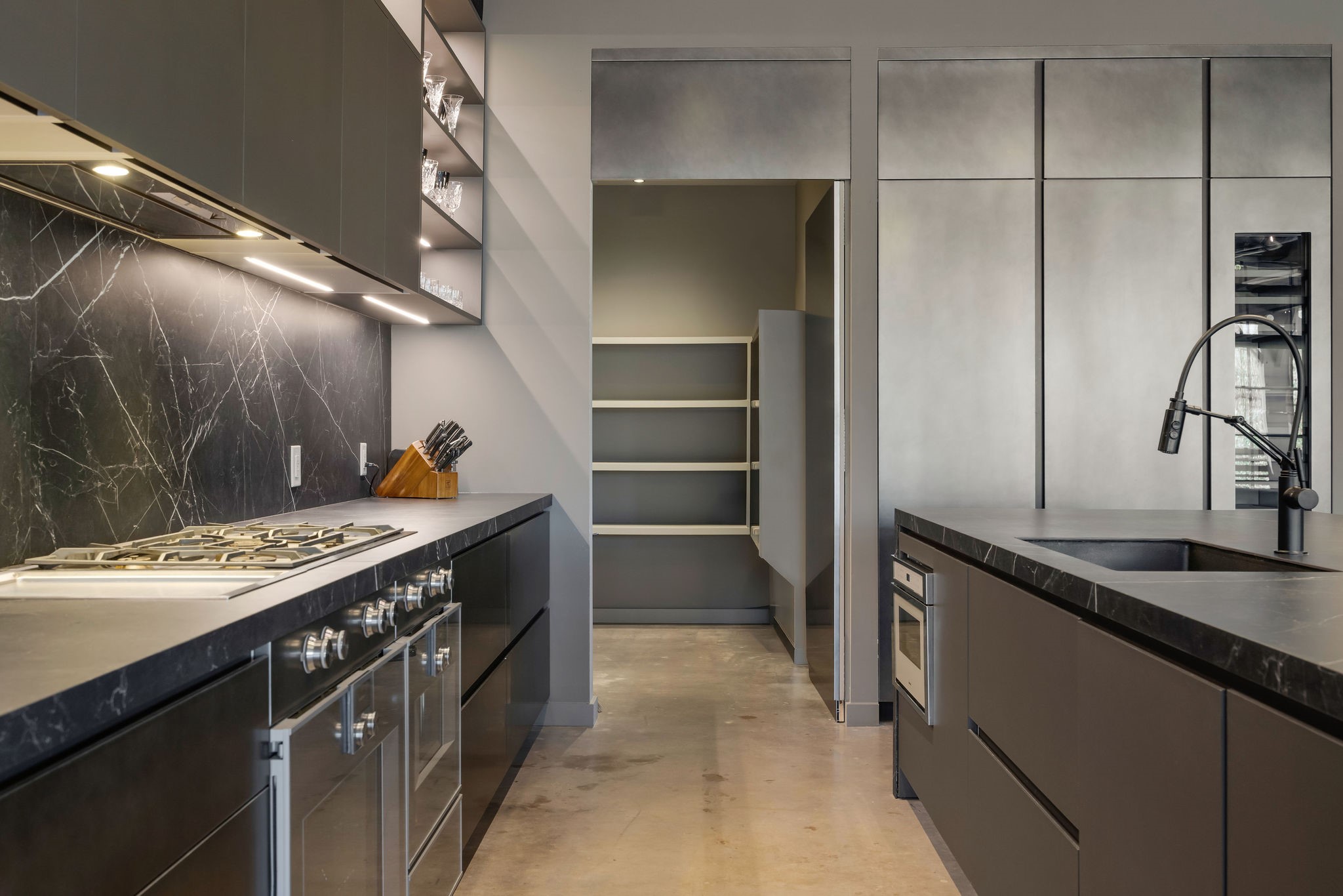 908 White Street Houston, TX 77007 - Photo 9 of 21 Kitchen and prep area with ample cabinetry, modern finishes, and adjacent walk-in pantry.
