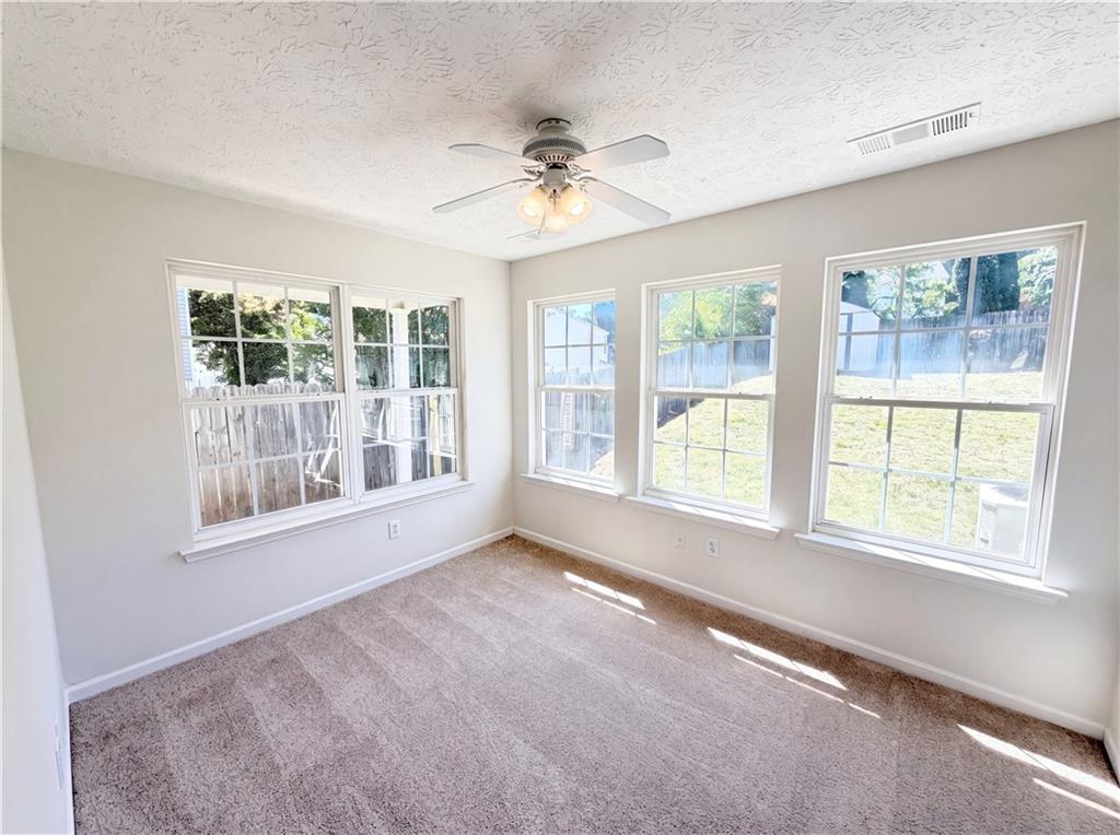 503 Oakleaf Court Acworth, GA 30102 - Photo 7 of 17 a view of an empty room with a window