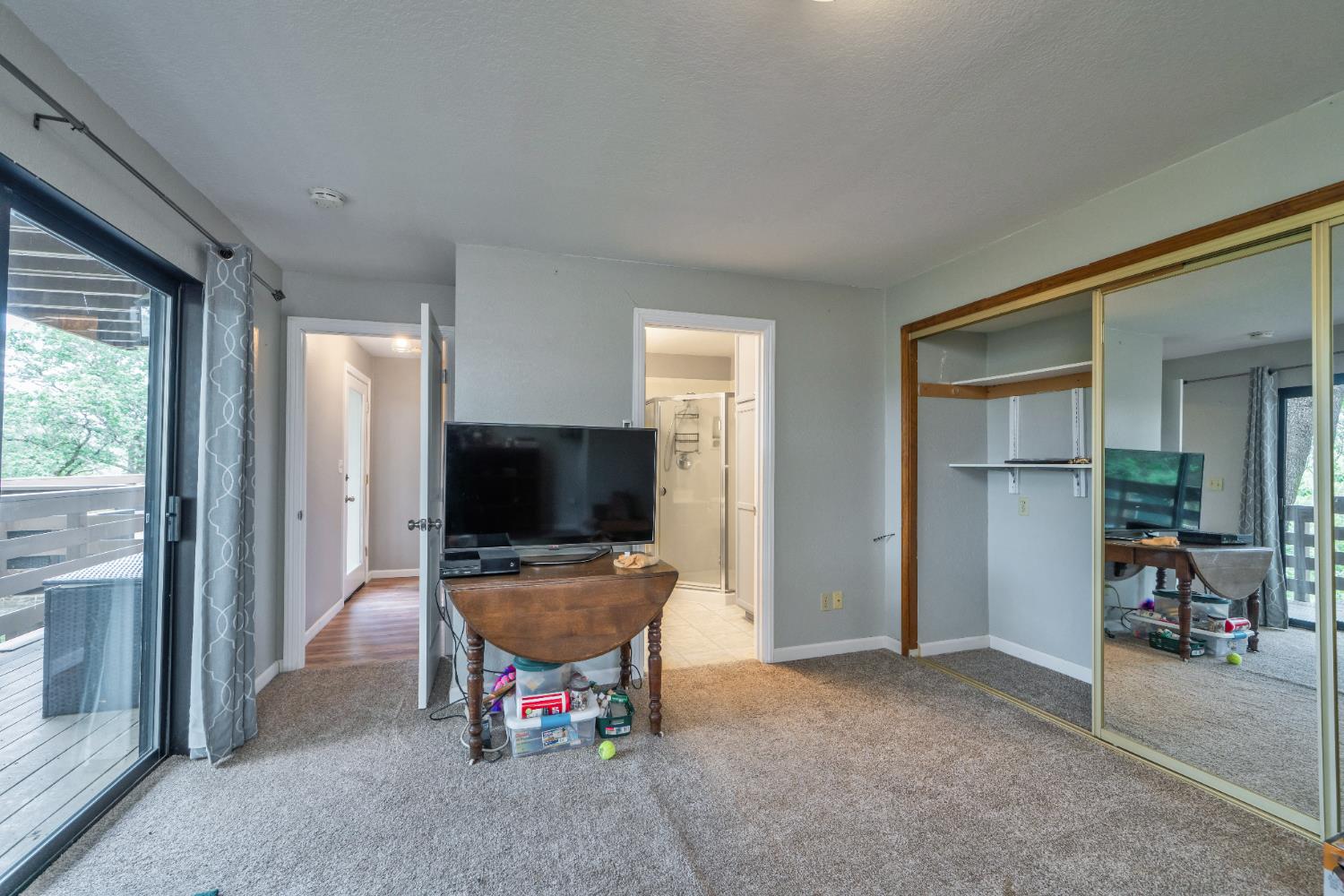 3041 Rising Hill Court Placerville, CA 95667 - Photo 15 of 31 a living room with furniture and a flat screen tv