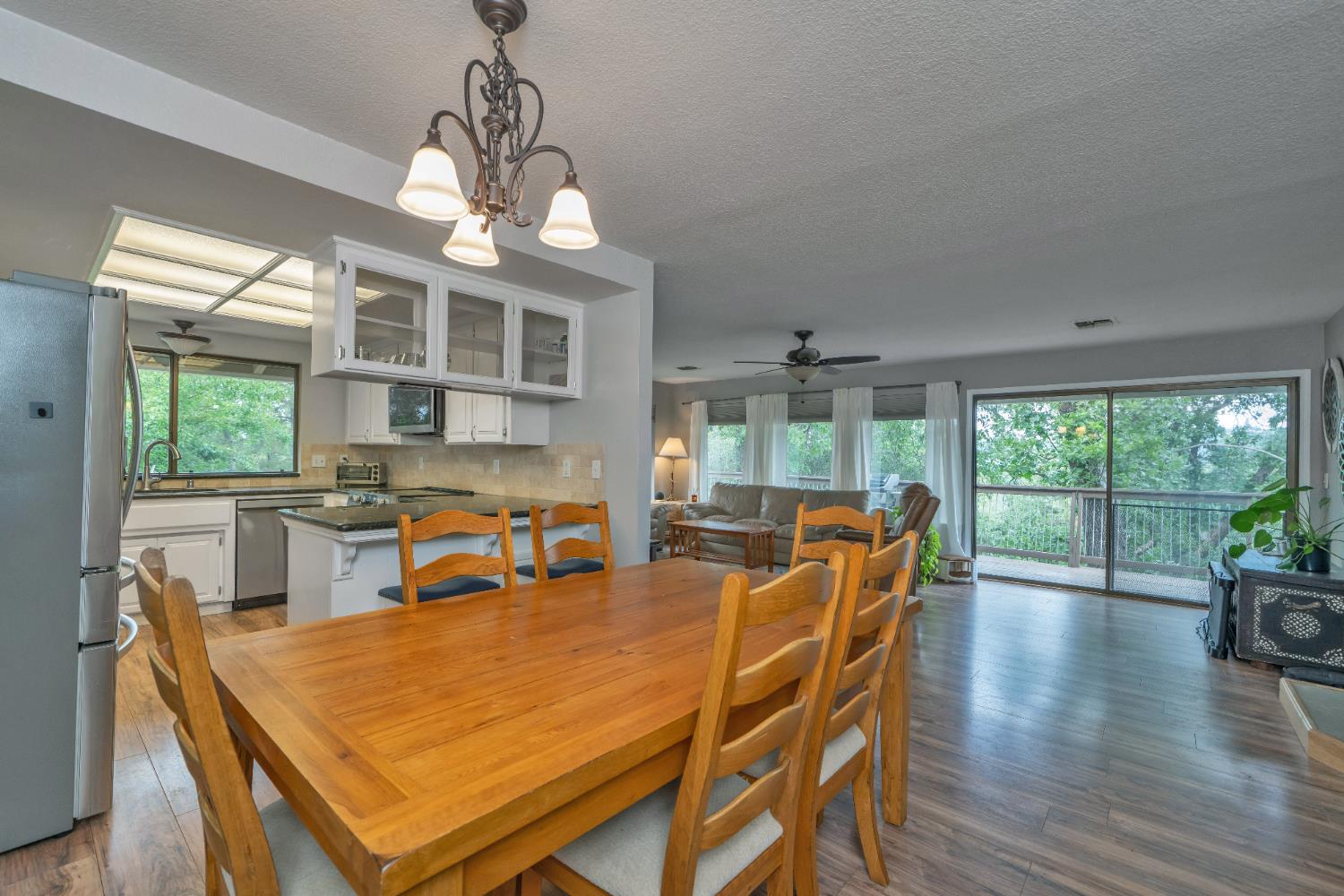 3041 Rising Hill Court Placerville, CA 95667 - Photo 17 of 31 a view of a dining room with furniture window and outside view