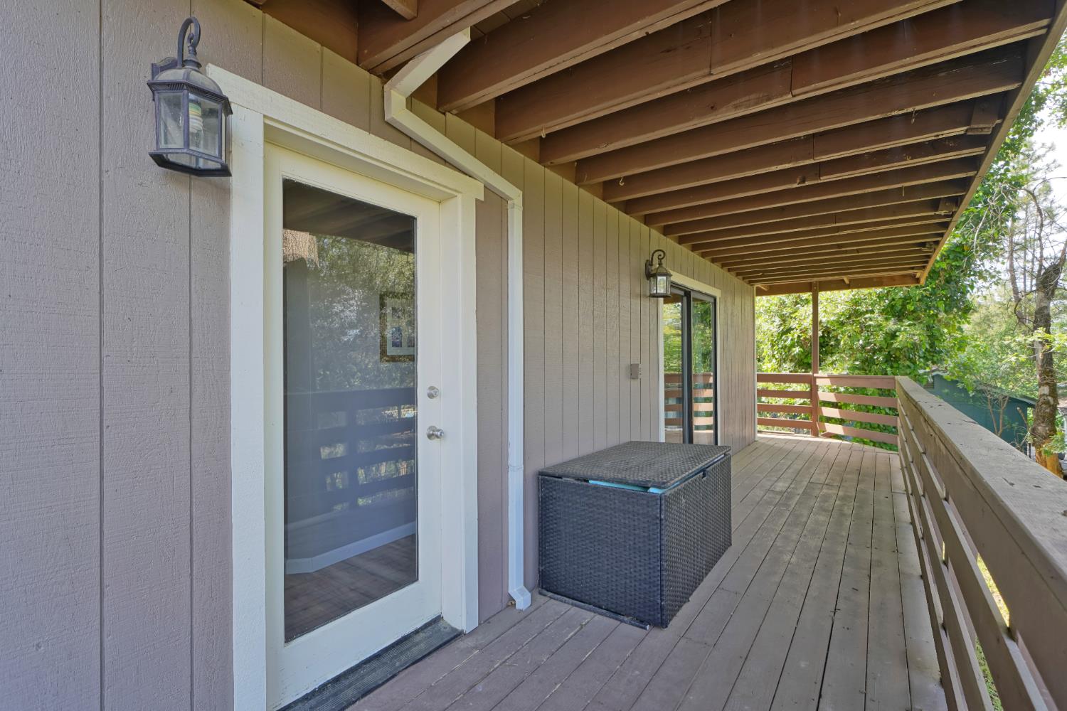 3041 Rising Hill Court Placerville, CA 95667 - Photo 21 of 31 a view of a balcony with wooden floor and iron stairs